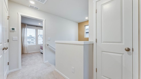 hallway with carpet