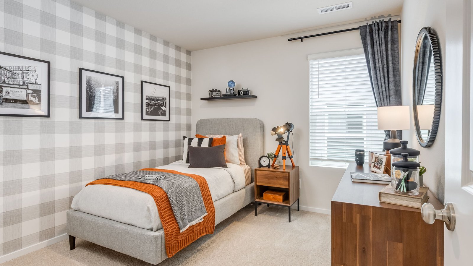 Bedroom with wall-to-wall carpet and a closet