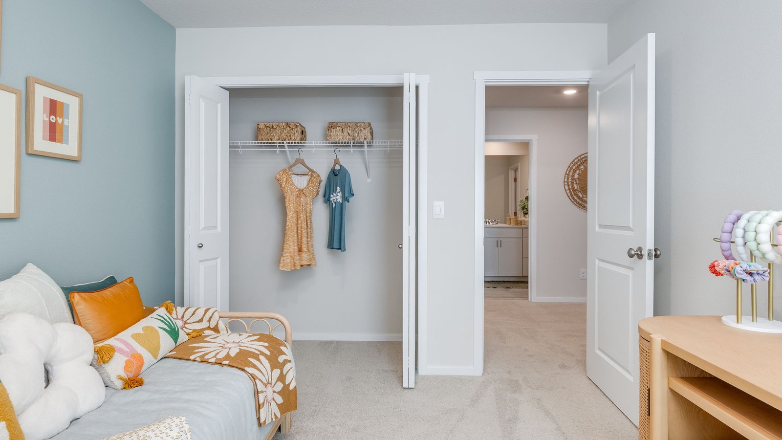 Bedroom with wall-to-wall carpet and a closet
