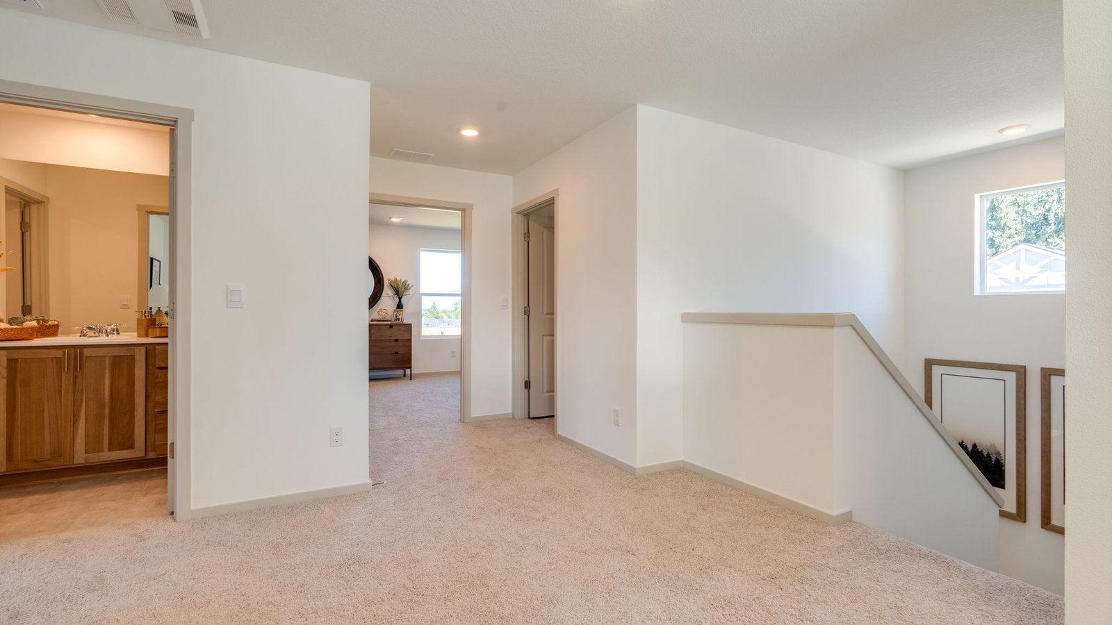 Hallway with wall-to-wall carpet