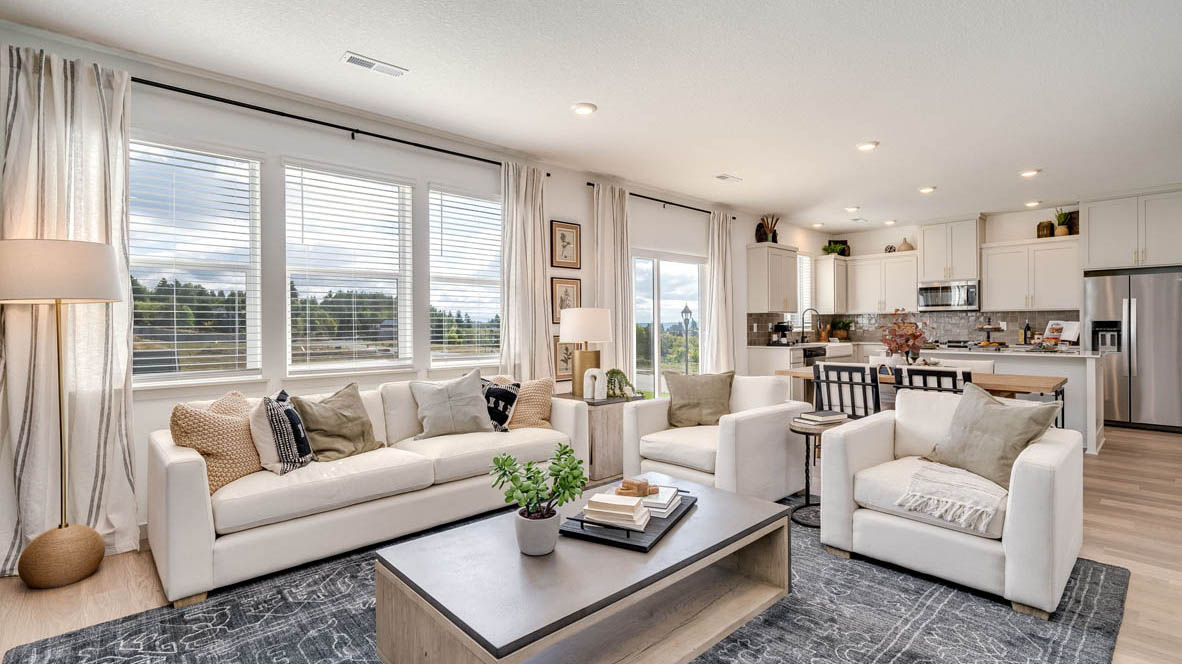 Great room with laminate flooring and an electric fireplace