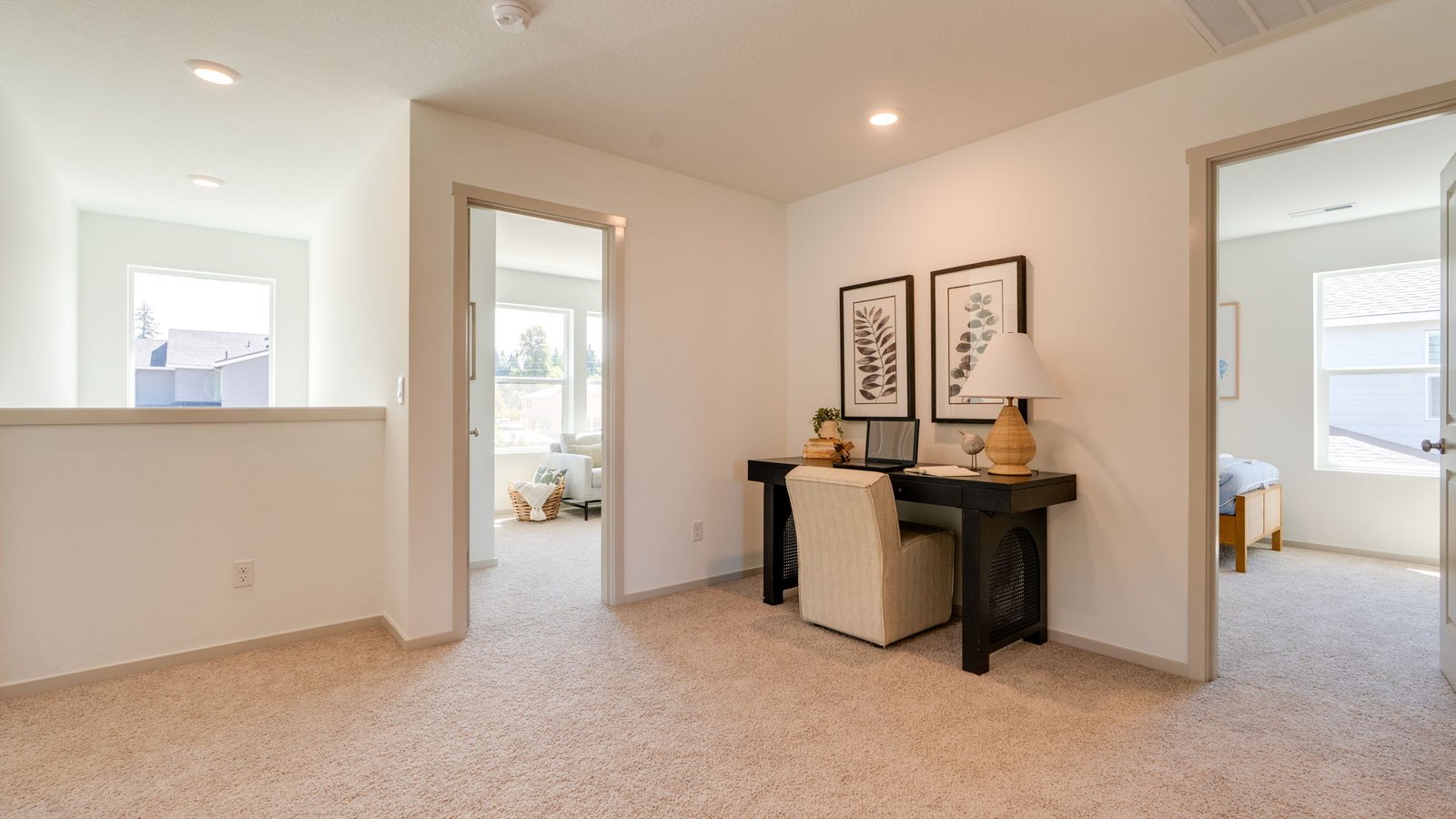 Hallway with wall-to-wall carpet