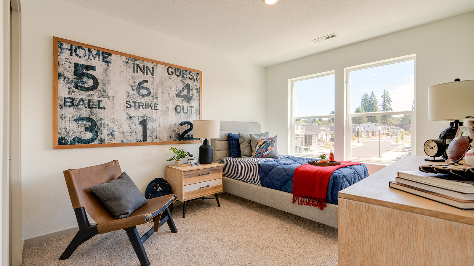 Bedroom with wall-to-wall carpet and a closet