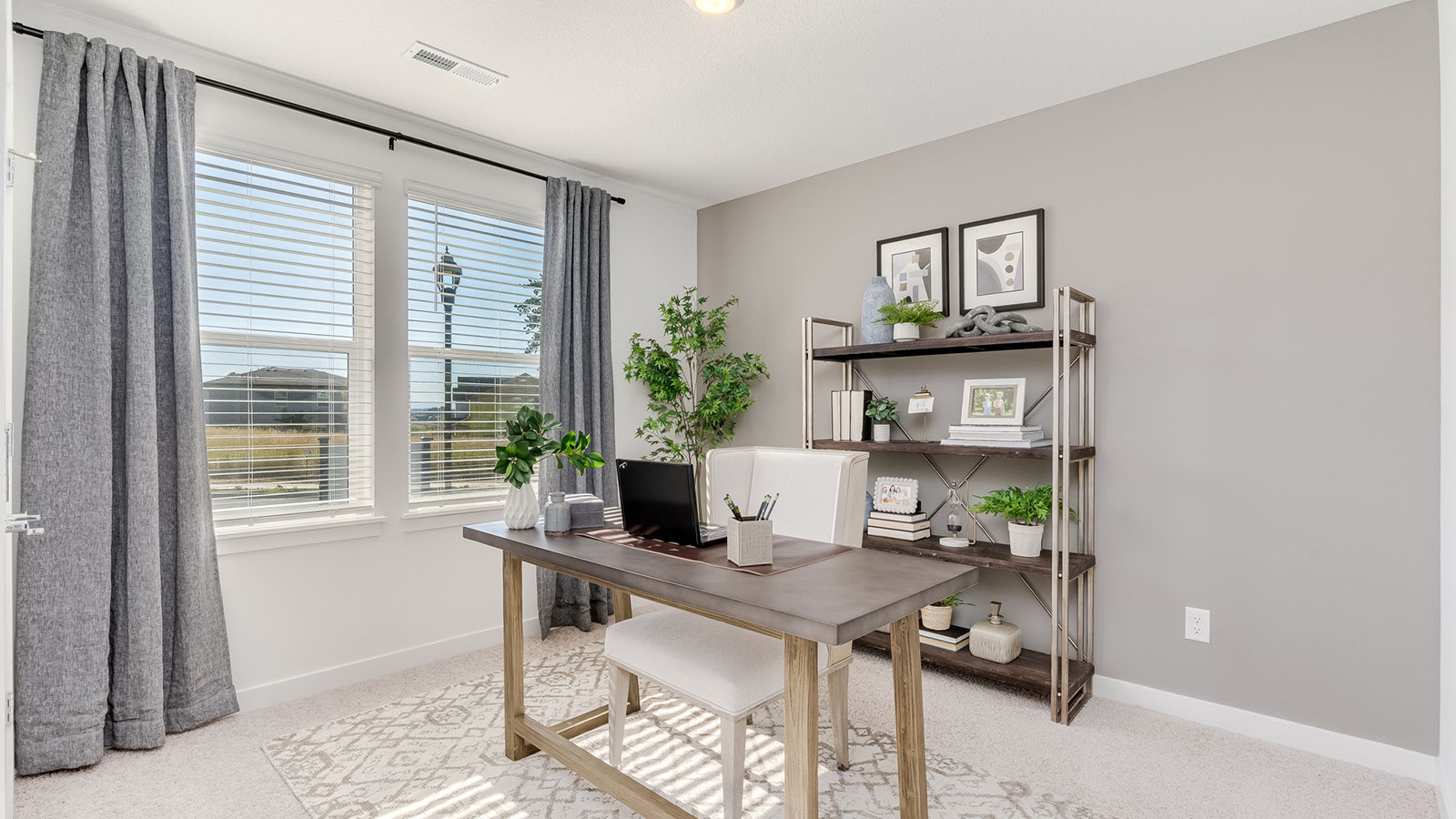 Bedroom with wall-to-wall carpet and a closet