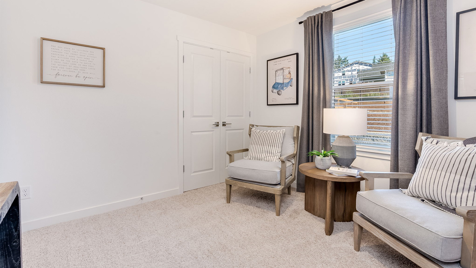 Bedroom with wall-to-wall carpet and a closet