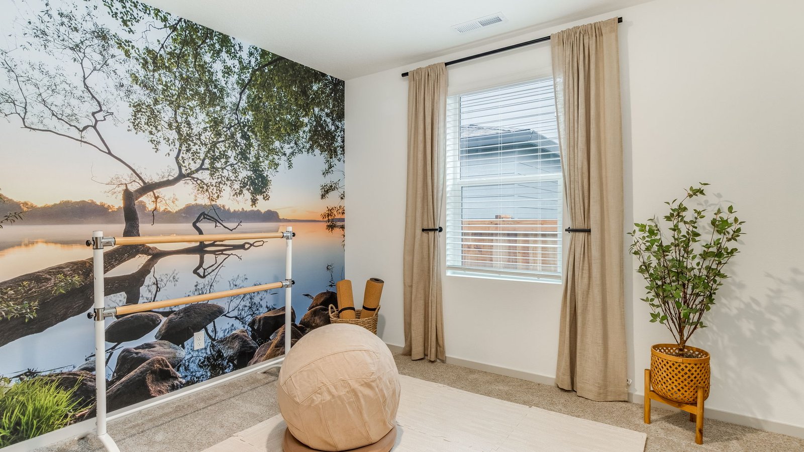 Bedroom with wall-to-wall carpet and a closet