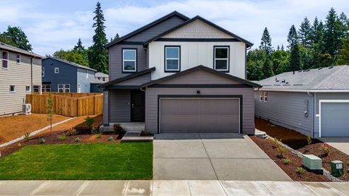 Exterior of a single-family 2-story home at Stonewood Haven II is a new home community in Battle Ground, Washington.