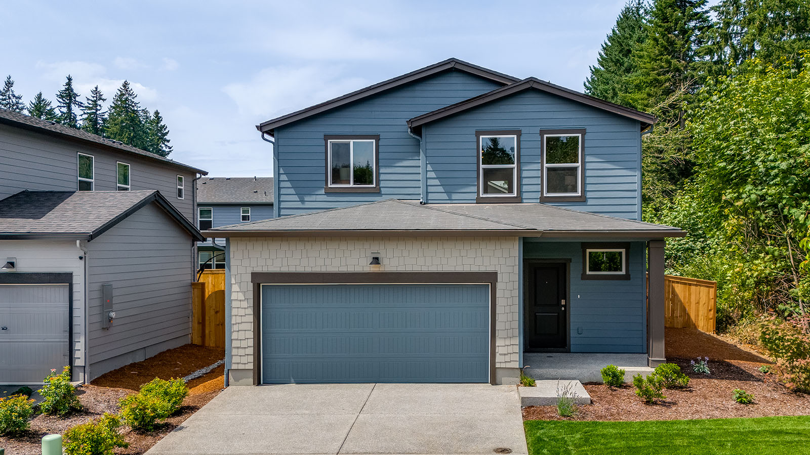 exterior front single-family home with a 2-car garage