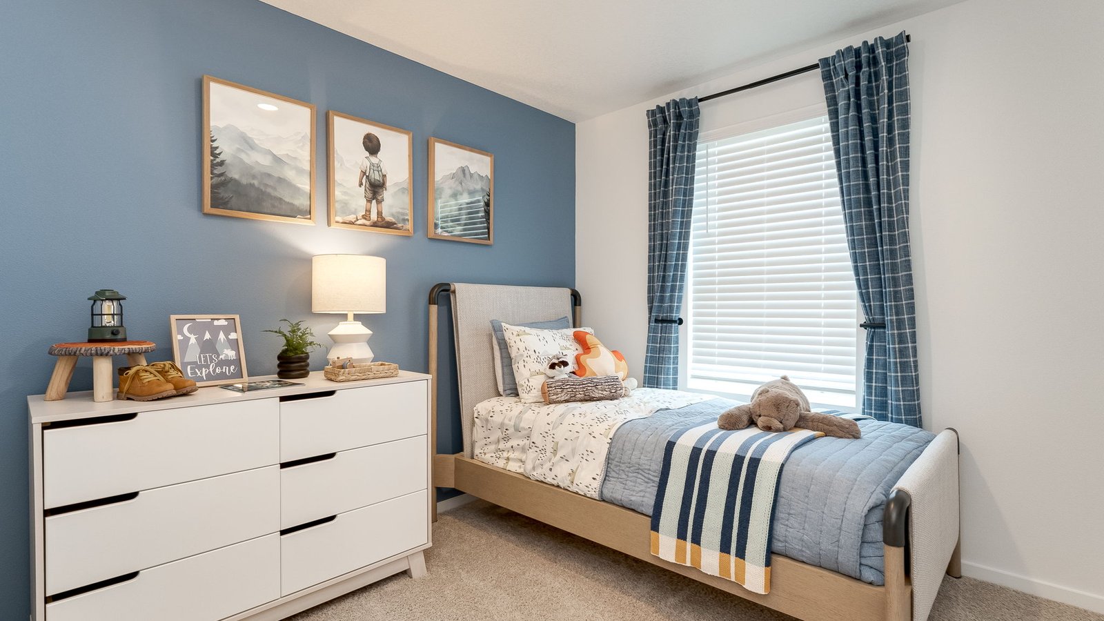 Bedroom with wall-to-wall carpet and a closet