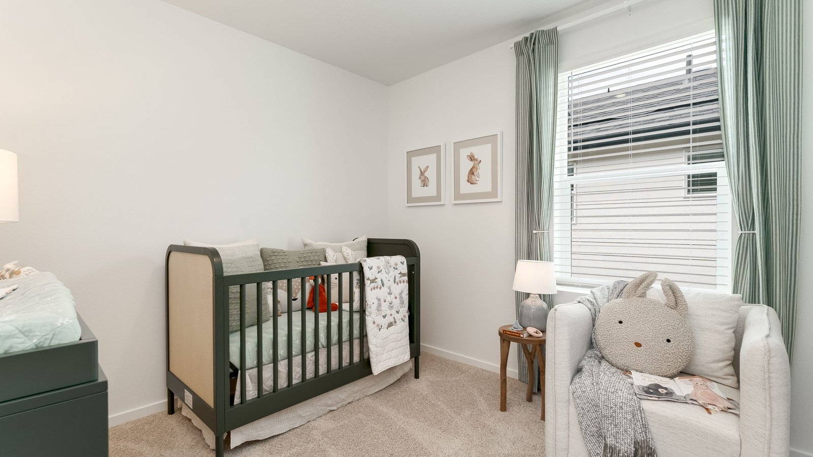 Bedroom with wall-to-wall carpet and a closet