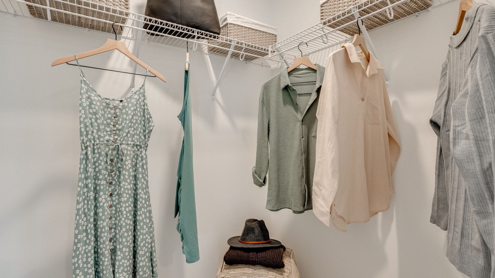Primary bedroom walk-in closet with wire shelves