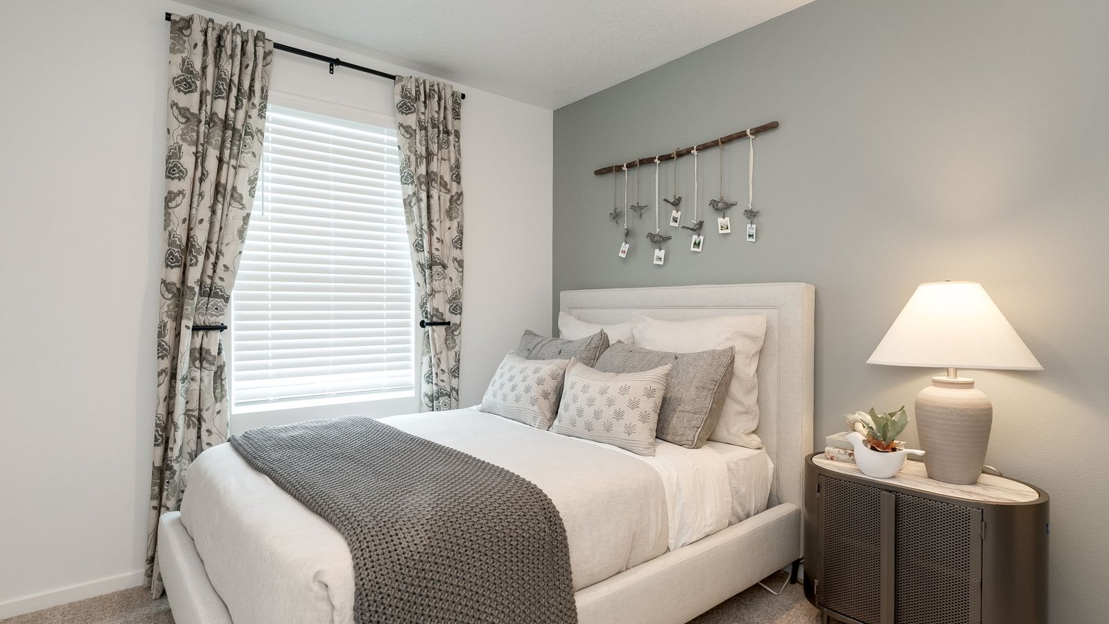 Bedroom with wall-to-wall carpet and a closet