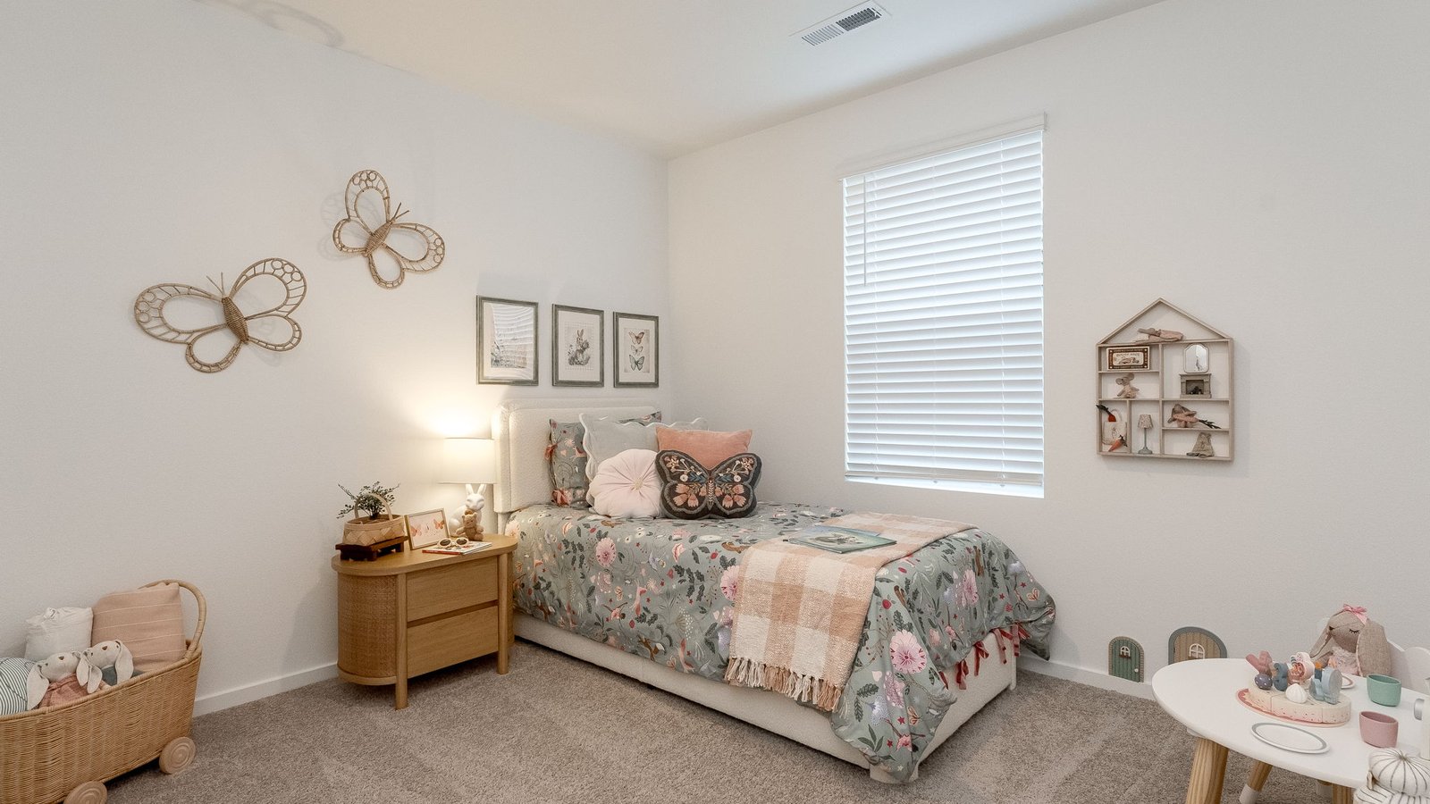 Bedroom with wall-to-wall carpet and a closet