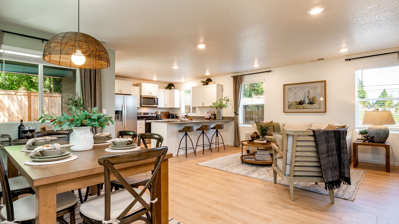 Great room with laminate flooring and an electric fireplace