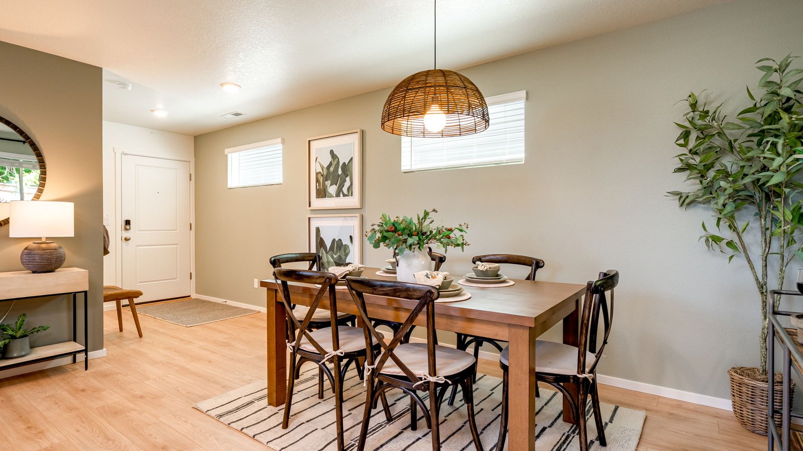 Great room with laminate flooring and an electric fireplace