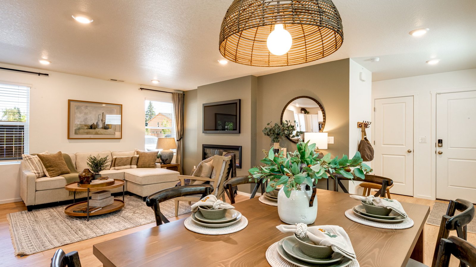 Great room with laminate flooring and an electric fireplace