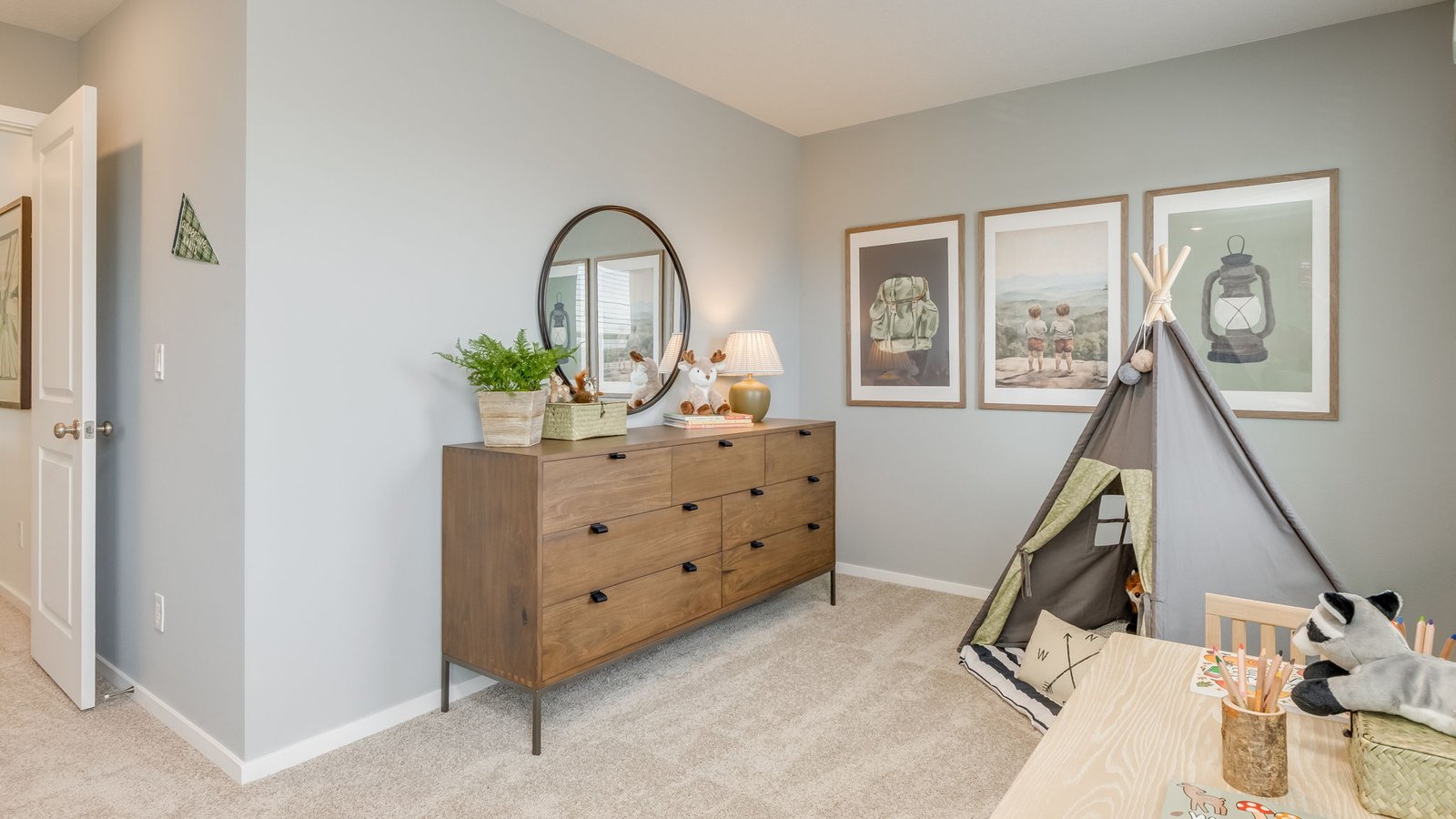 Bedroom with wall-to-wall carpet and a closet