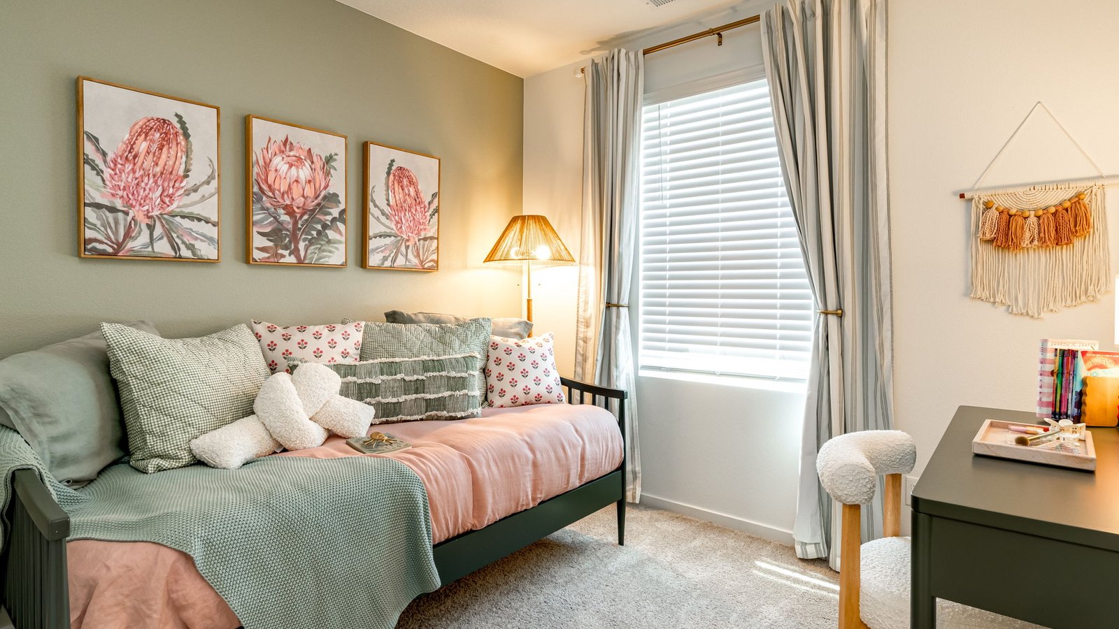 Bedroom with wall-to-wall carpet and a closet