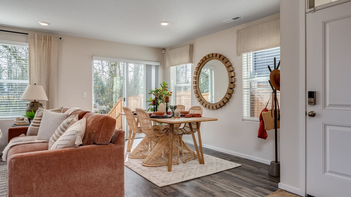 Dining area with a sliding glass door to a fenced backyard