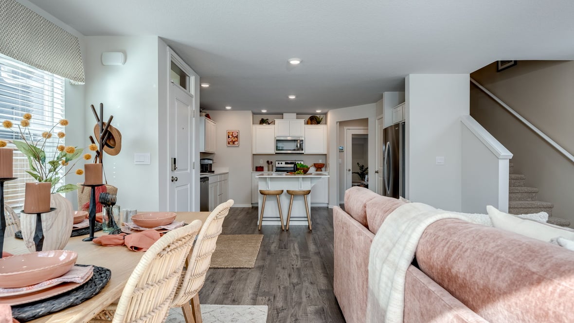 Great room with laminate flooring and an electric fireplace
