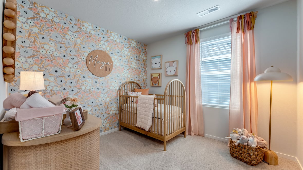 Bedroom with wall-to-wall carpet and a closet