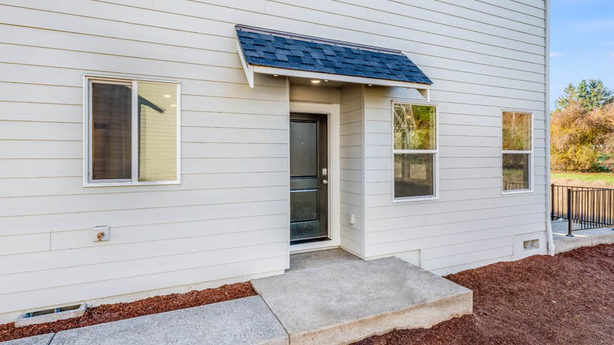 front door on side of 105 COHO LP