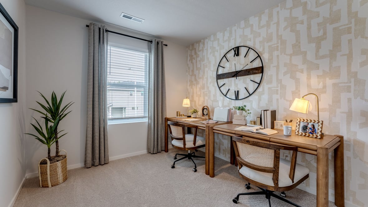 Bedroom with wall-to-wall carpet and a closet