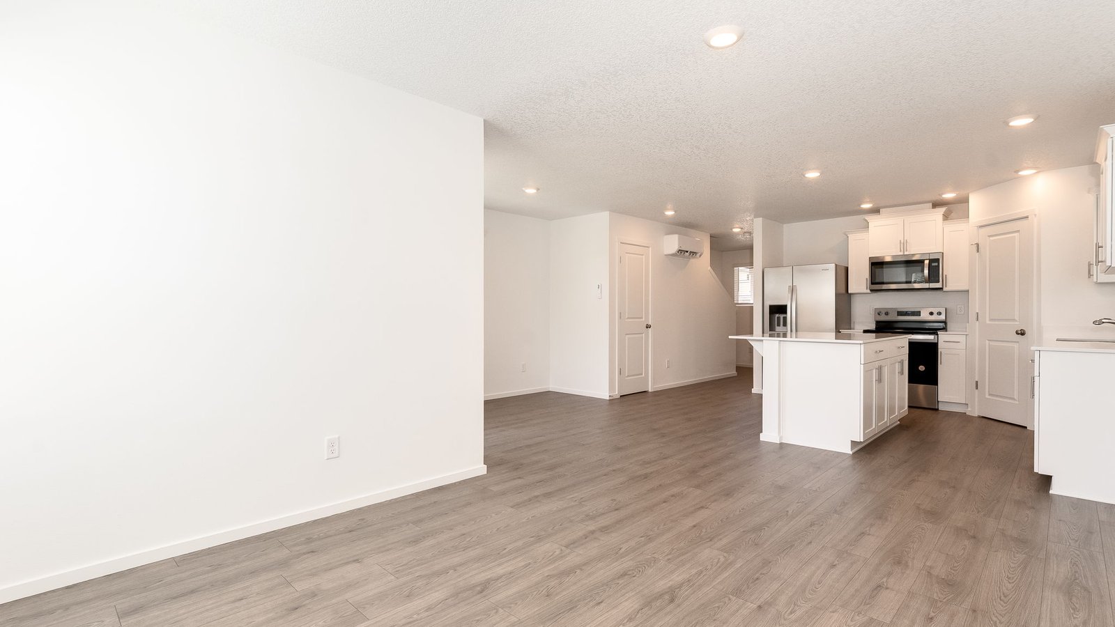 Great room with laminate flooring