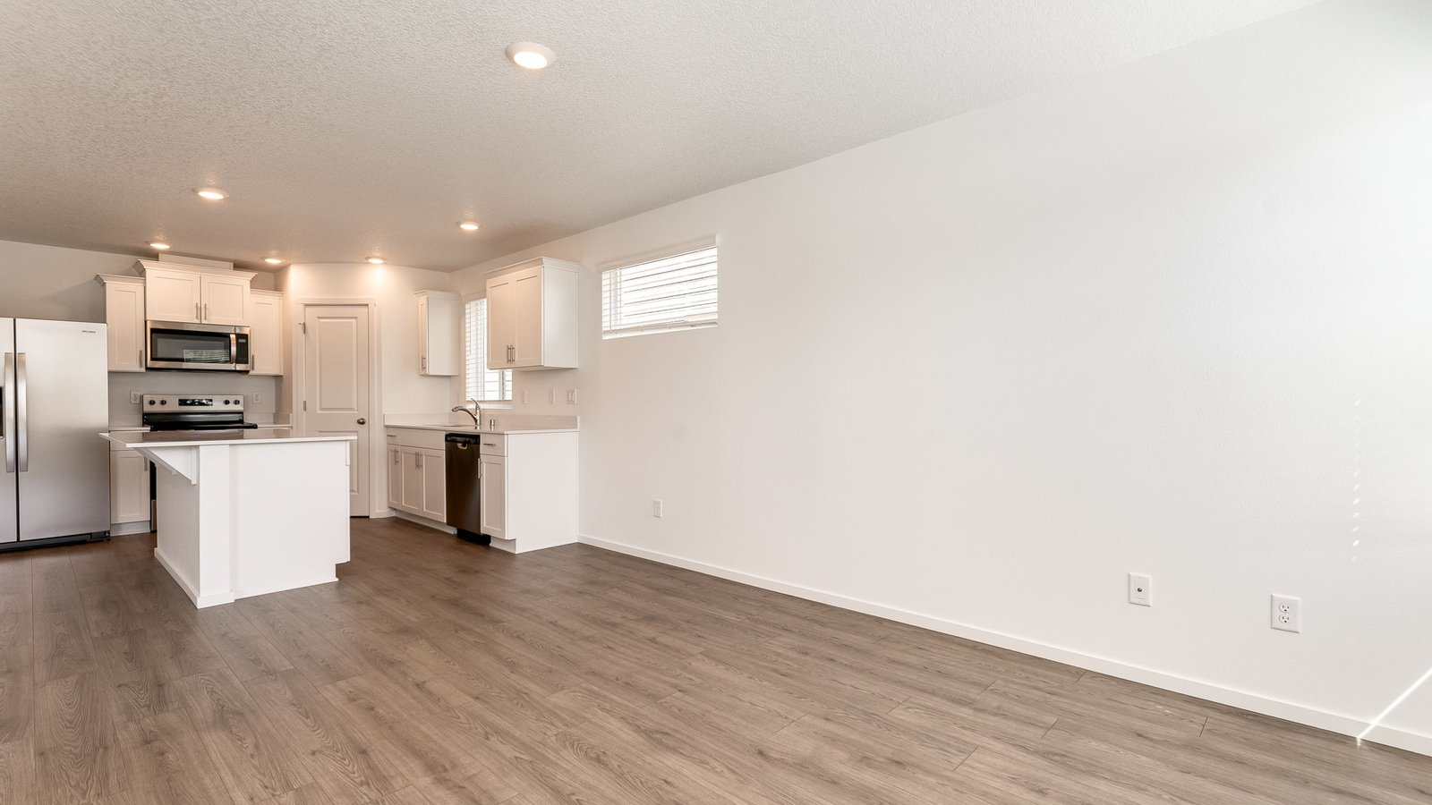 Great room with laminate flooring