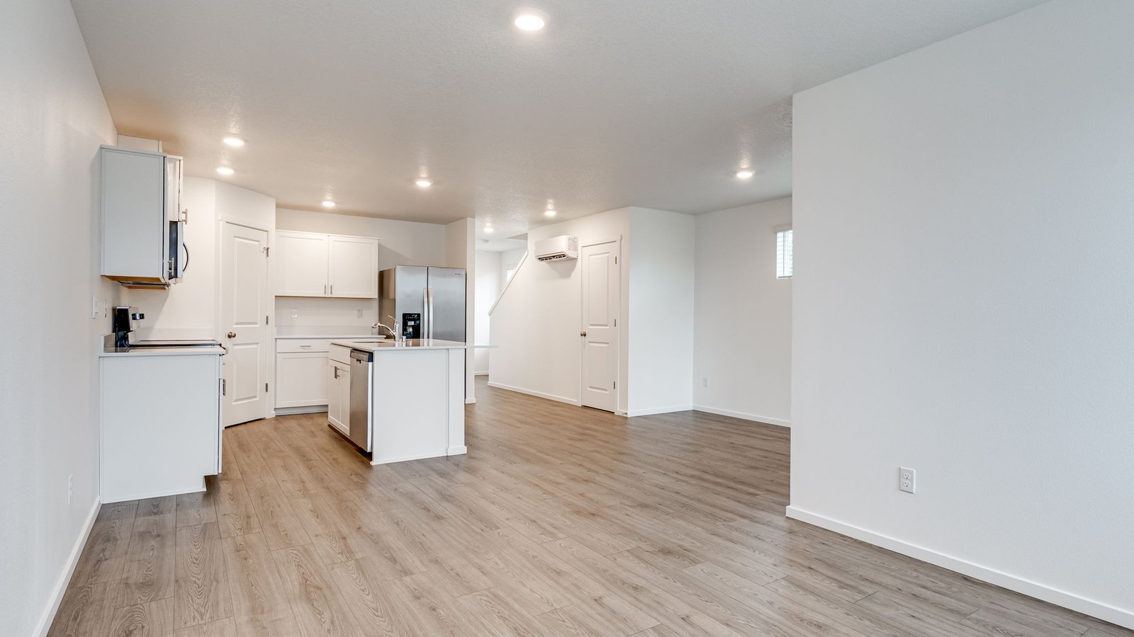 Great room with laminate flooring