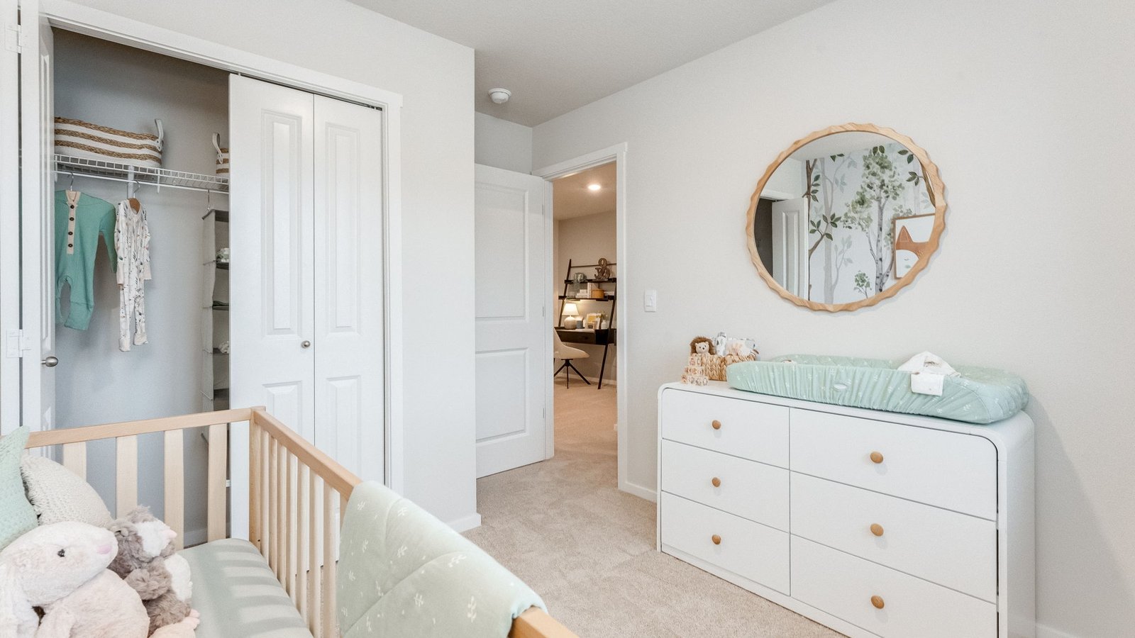 Bedroom with wall-to-wall carpet and a closet