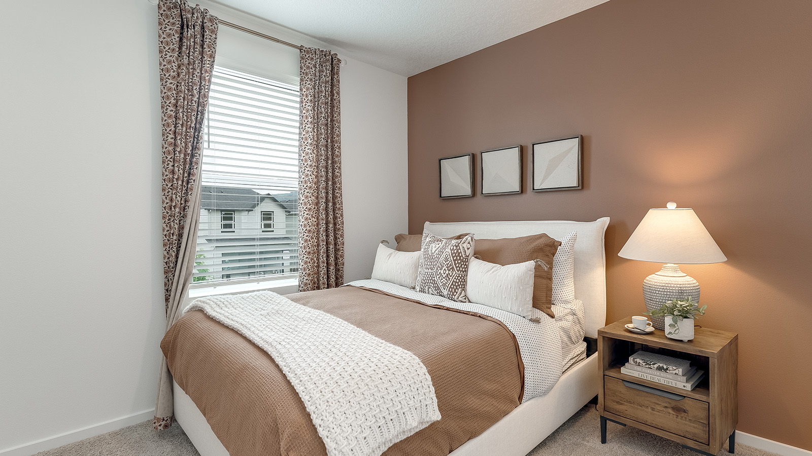 Bedroom with wall-to-wall carpet and a closet