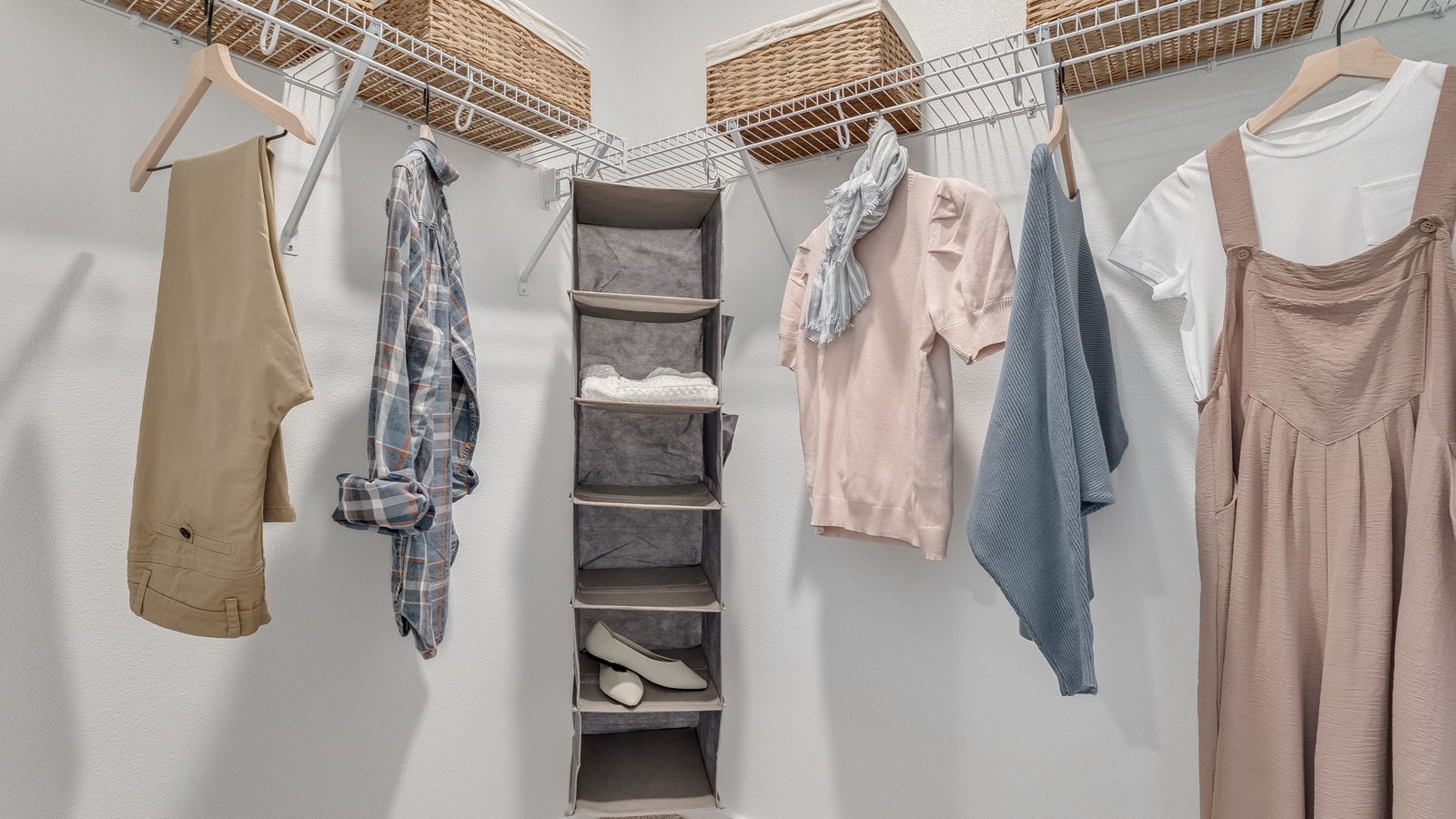 Primary bedroom walk-in closet with wire shelves