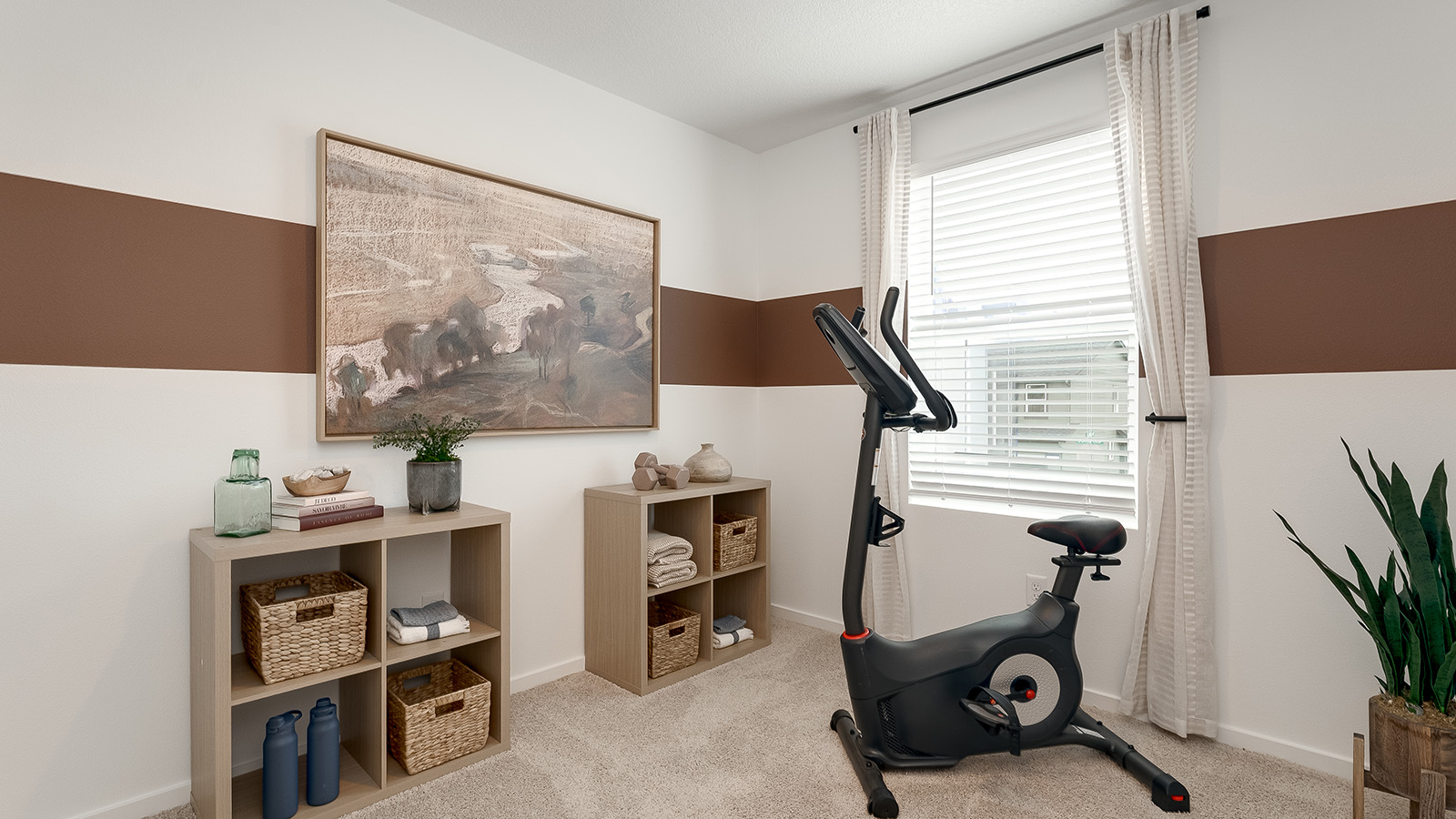 Bedroom with wall-to-wall carpet and a closet
