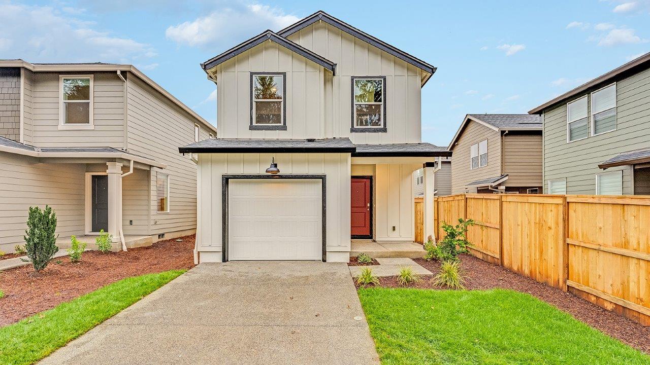 exterior front single-family home with an attached garage