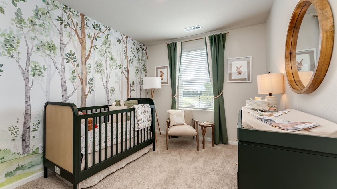 Bedroom with wall-to-wall carpet and a closet