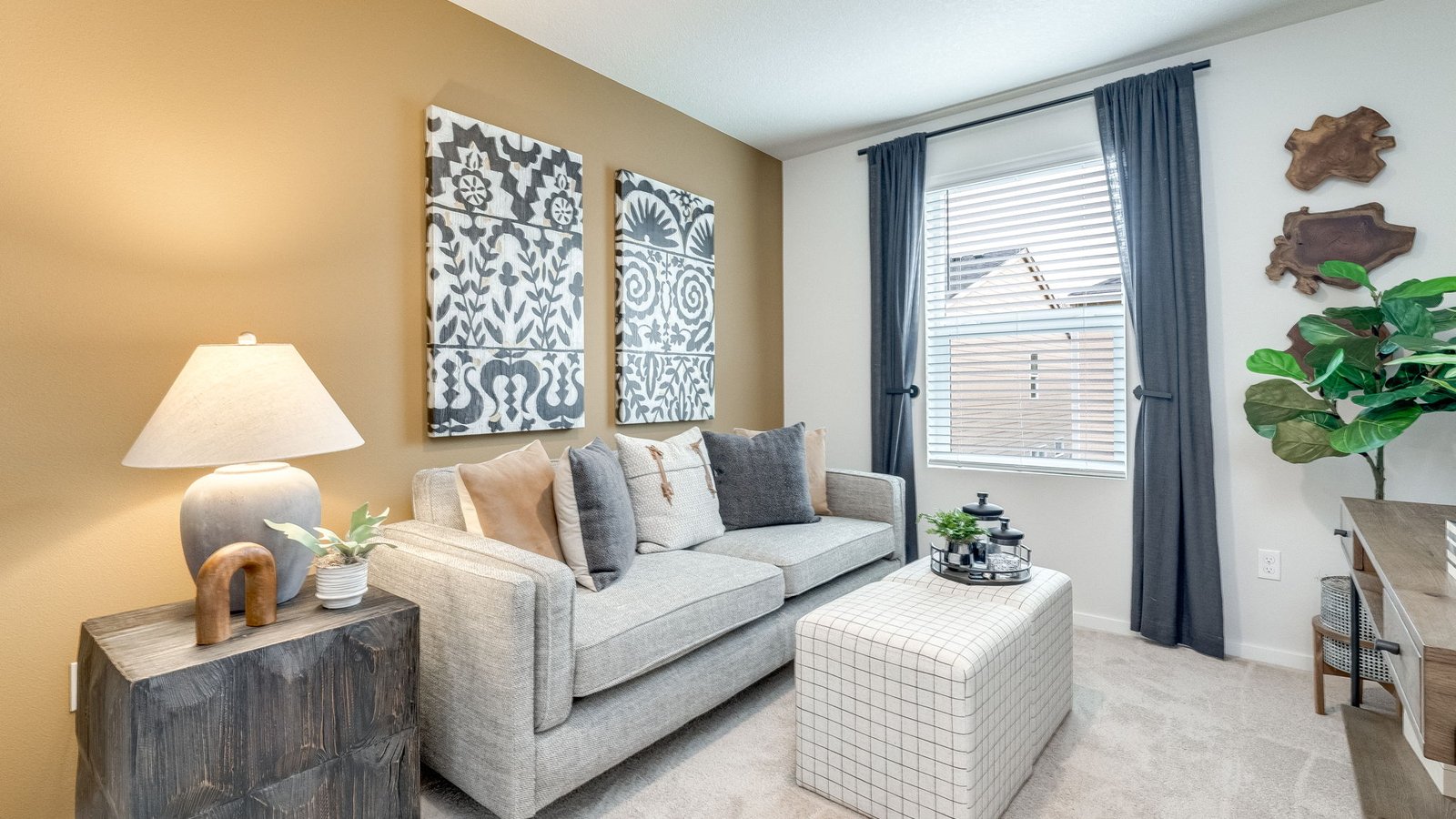 Bedroom with wall-to-wall carpet and a closet
