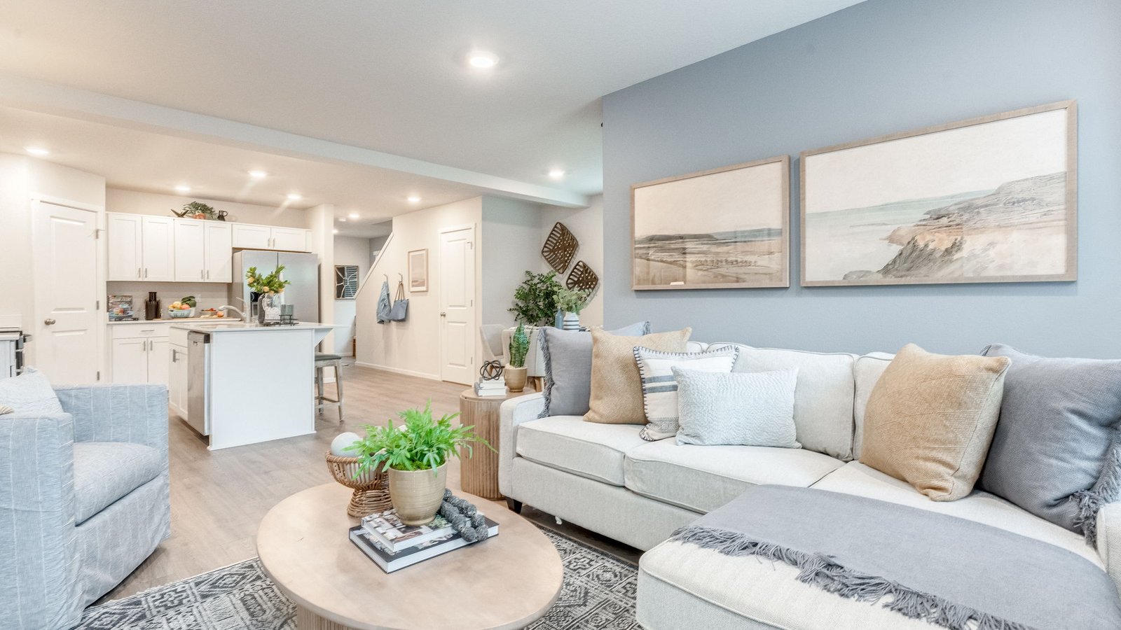 Great room with laminate flooring and an electric fireplace