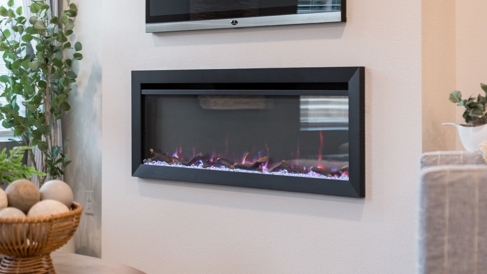 Great room with laminate flooring and an electric fireplace