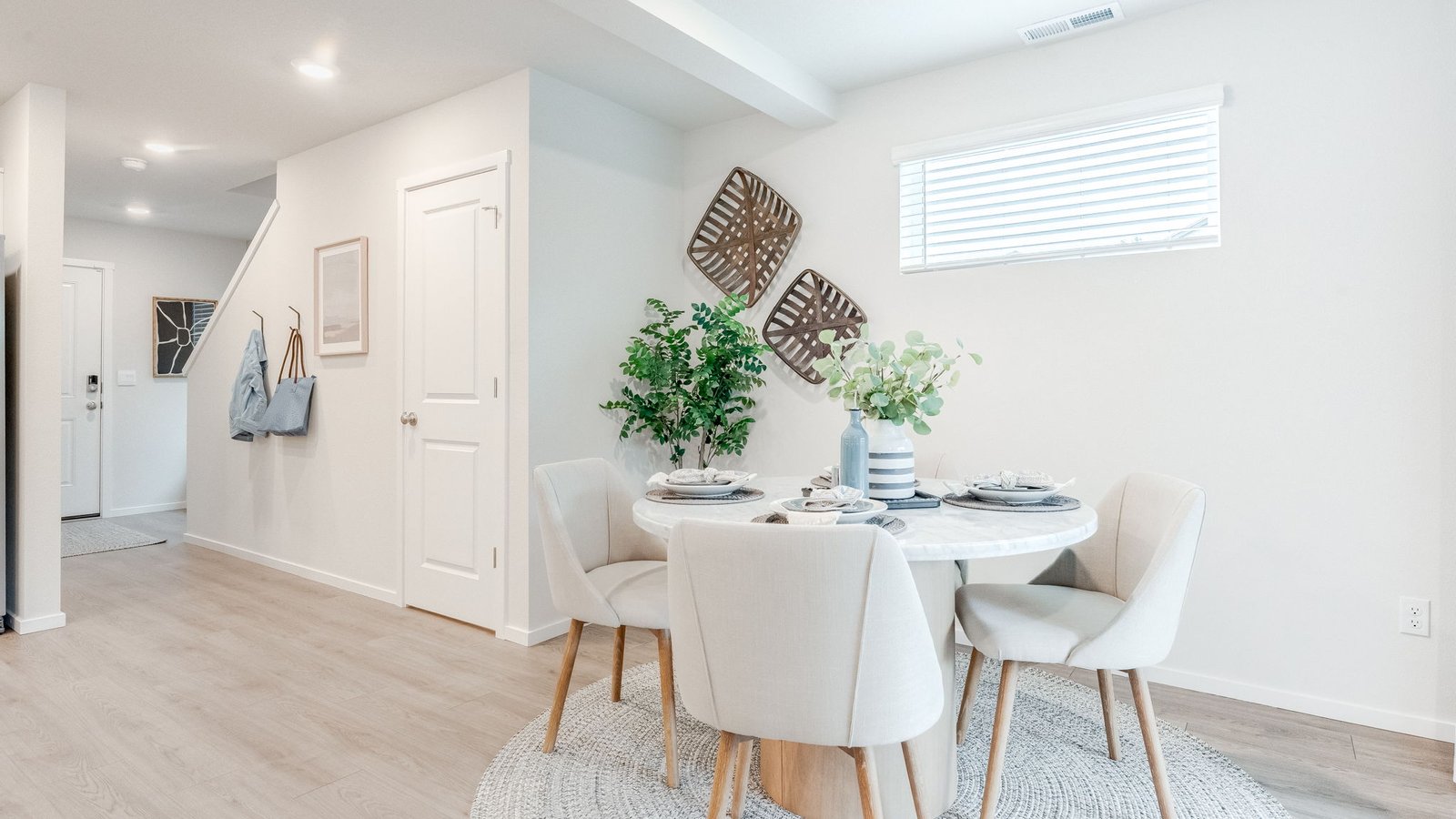 Dining area with a sliding glass door to a fenced backyard