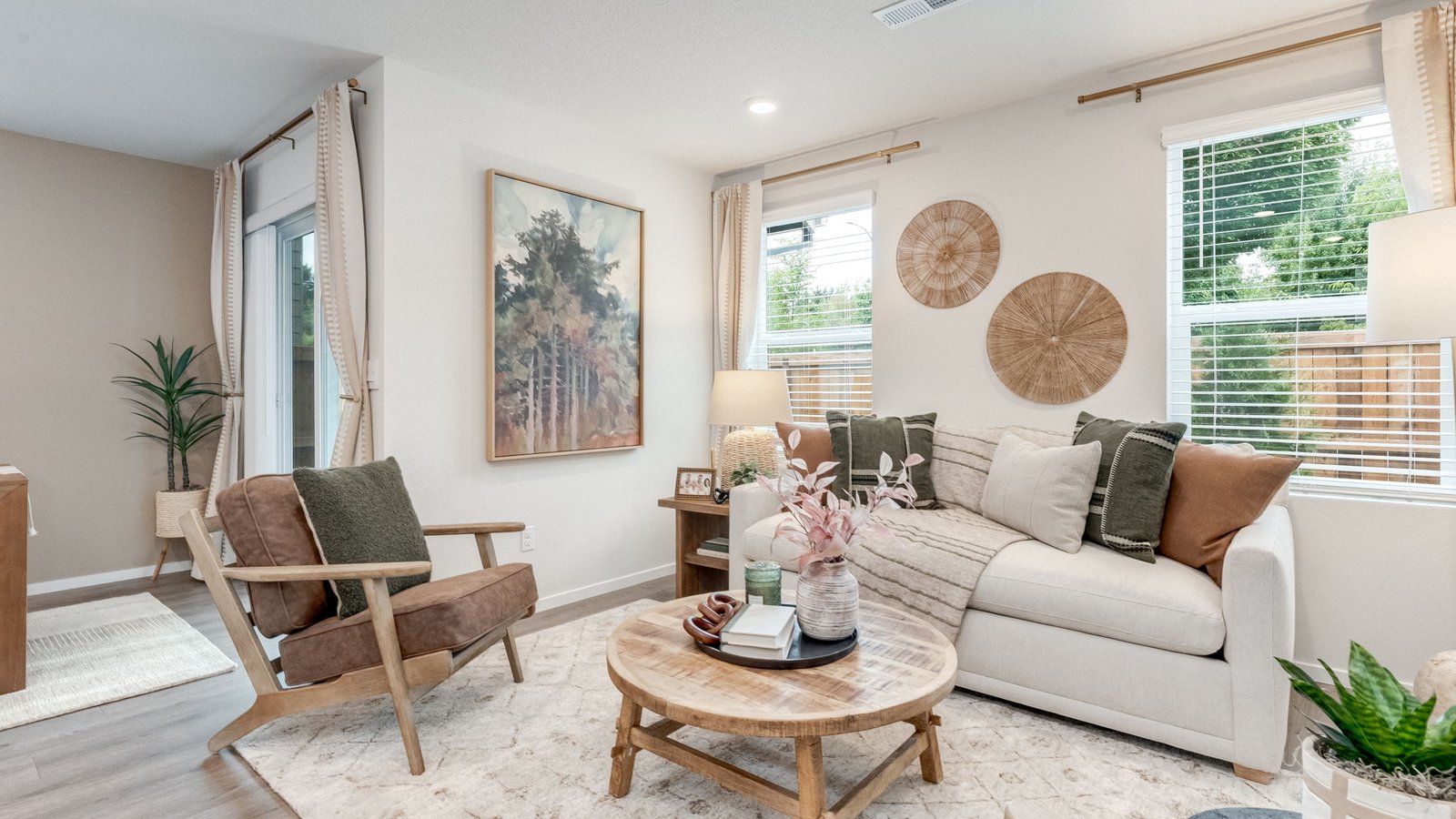 Great room with laminate flooring and an electric fireplace