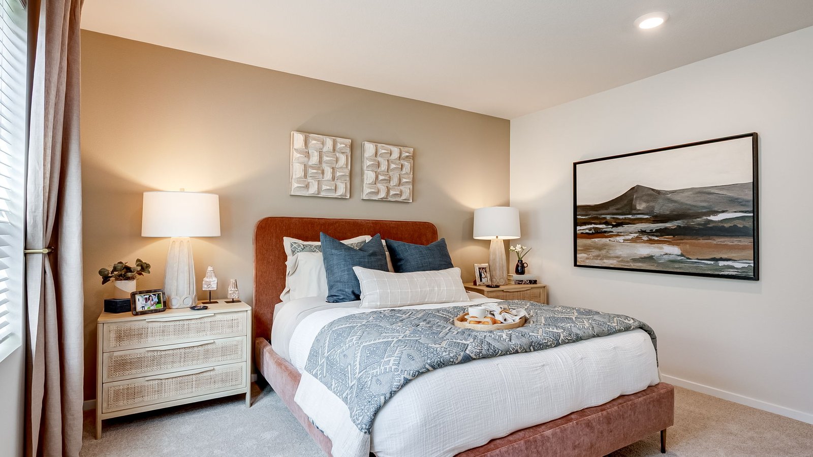 Primary bedroom with wall-to-wall carpet, a walk-in closet and an attached bathroom