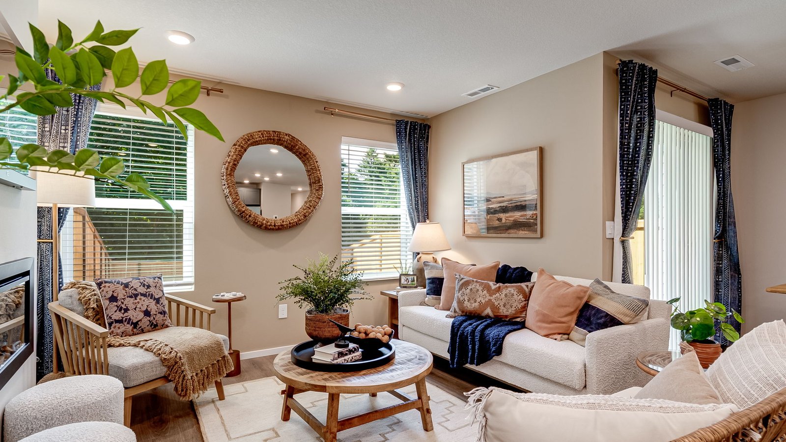 Great room with laminate flooring and an electric fireplace