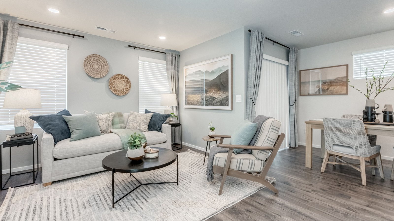 Great room with laminate flooring and an electric fireplace