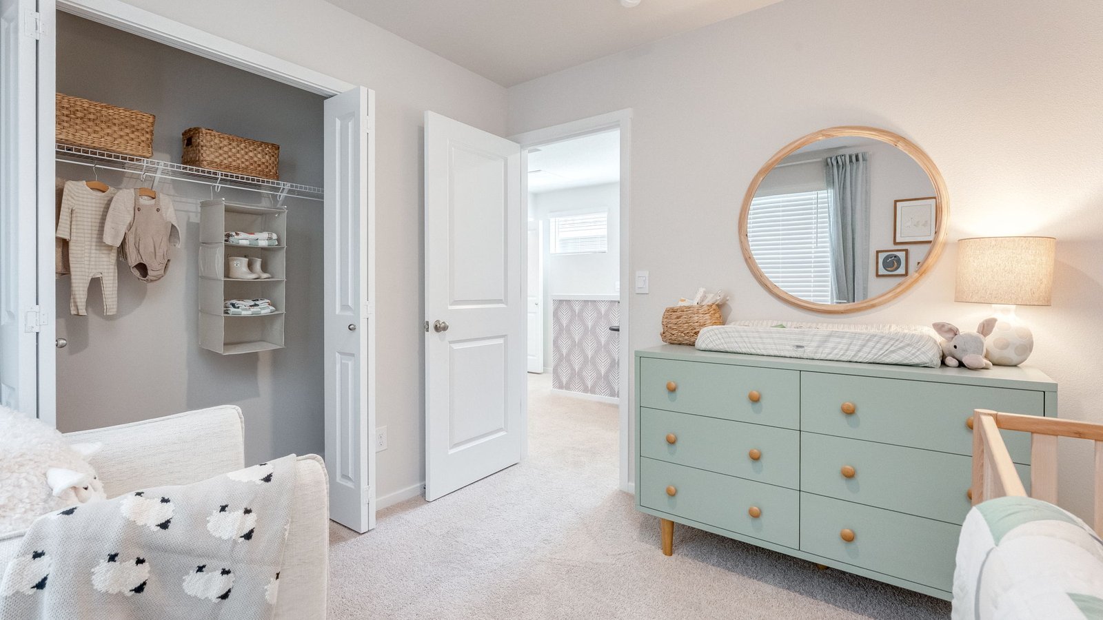 Bedroom with wall-to-wall carpet and a closet