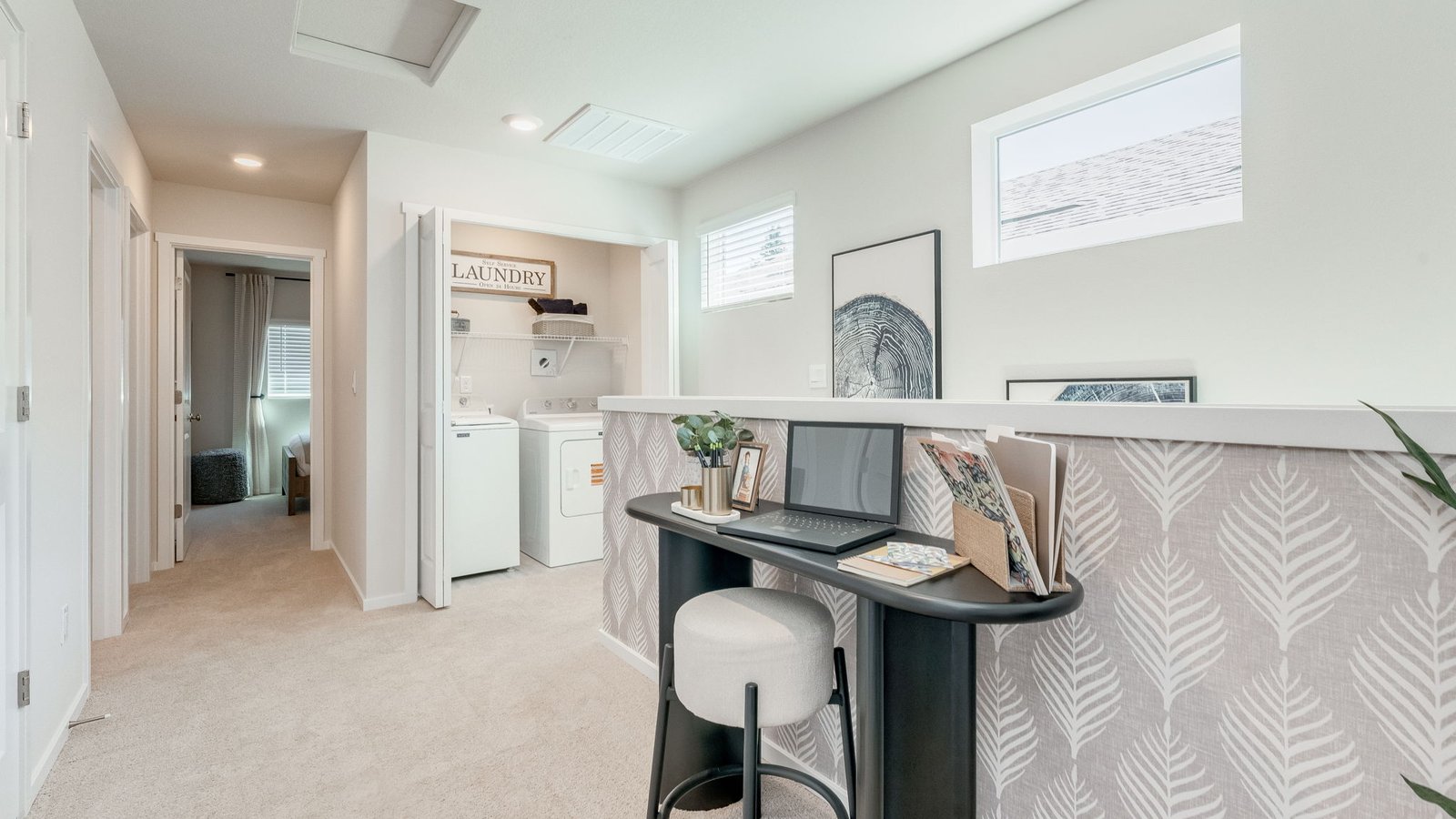 Hallway with wall-to-wall carpet