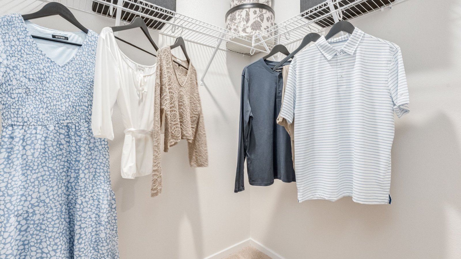 Primary bedroom walk-in closet with wire shelves
