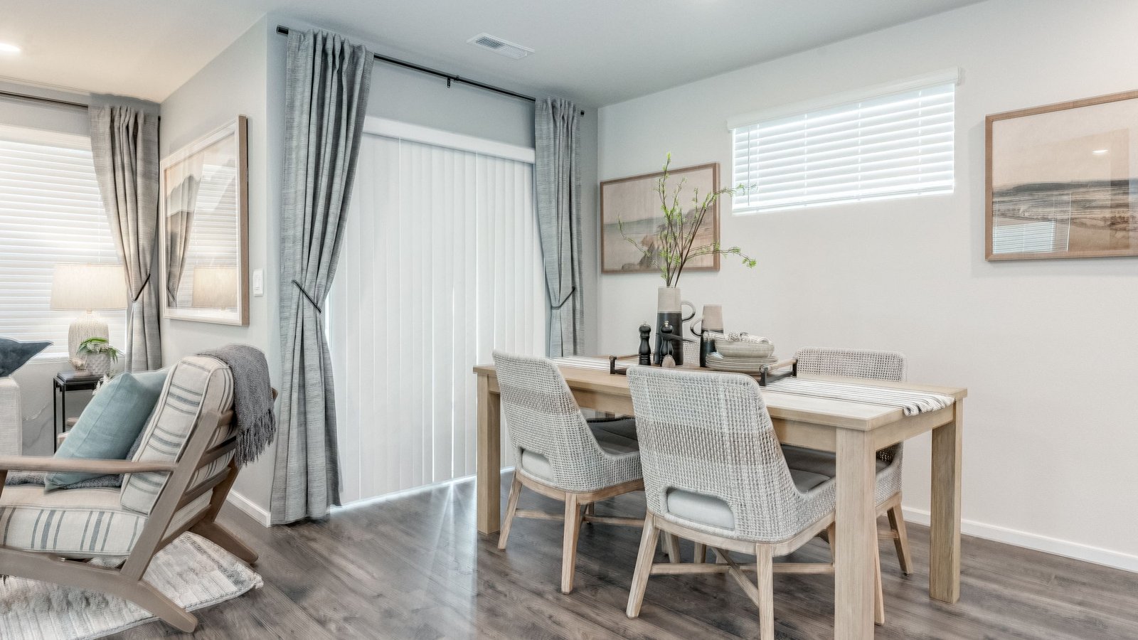 Dining area with a sliding glass door to a fenced backyard