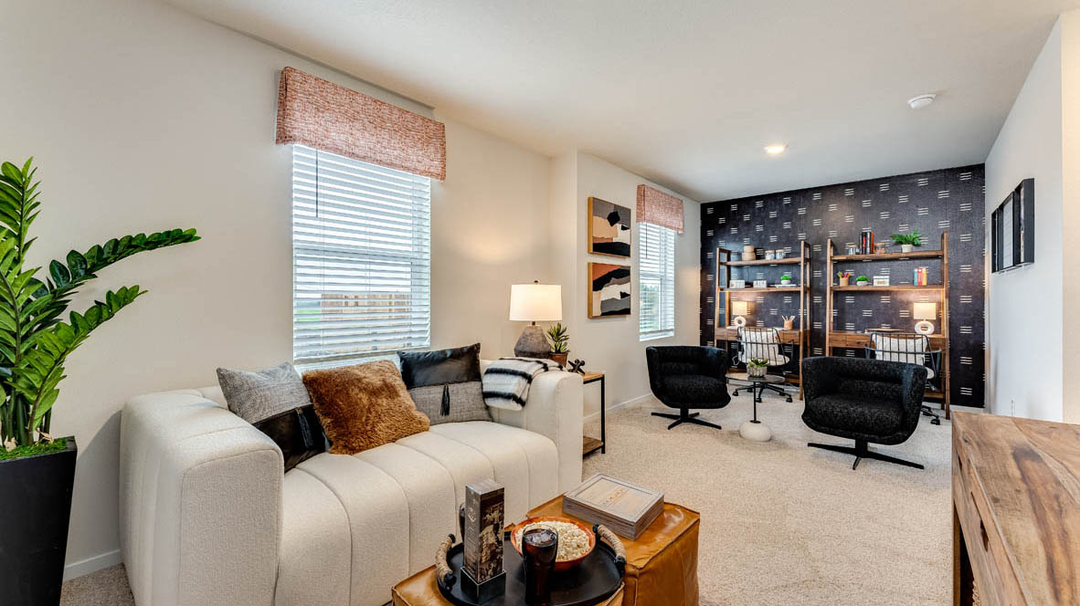 Bedroom with wall-to-wall carpet and a closet