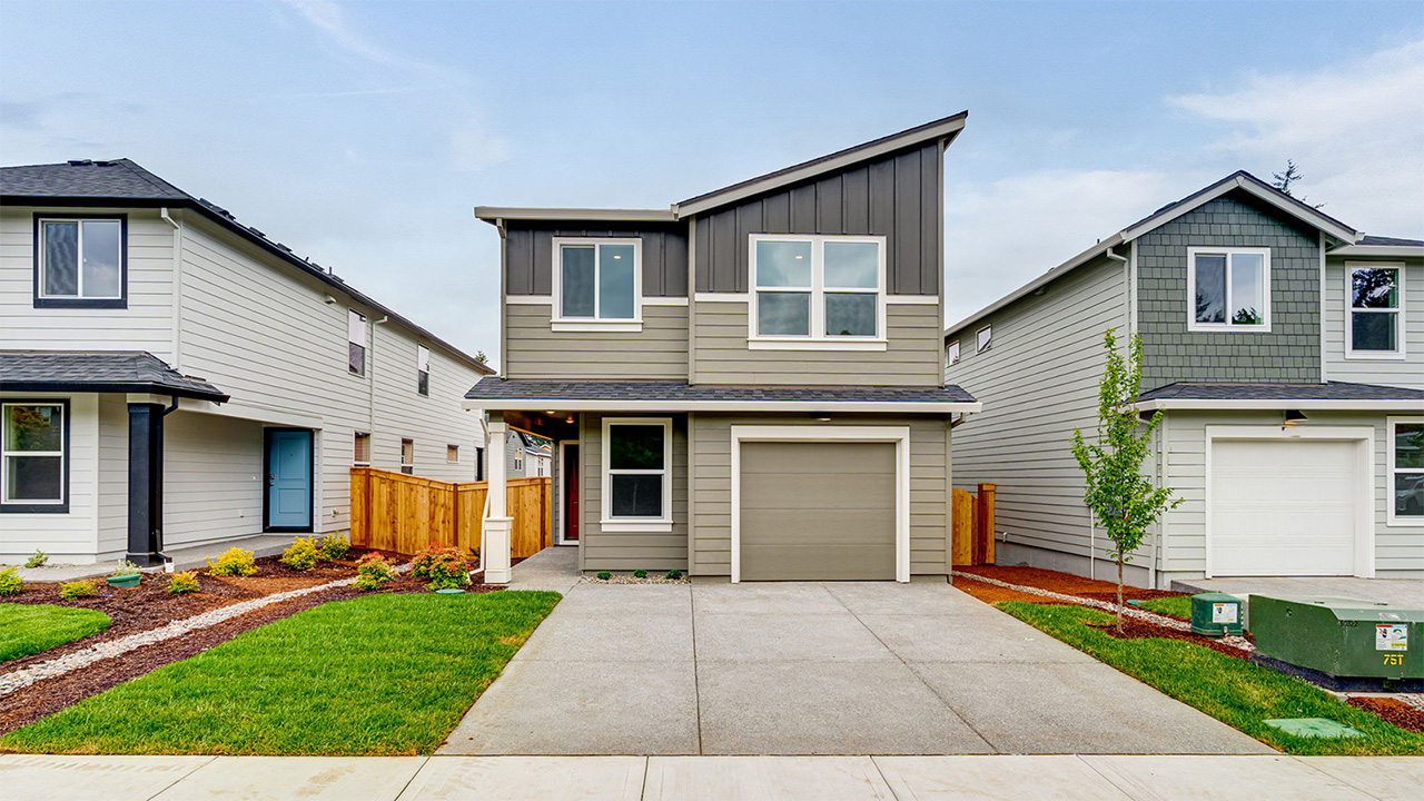exterior front single-family home with an attached garage